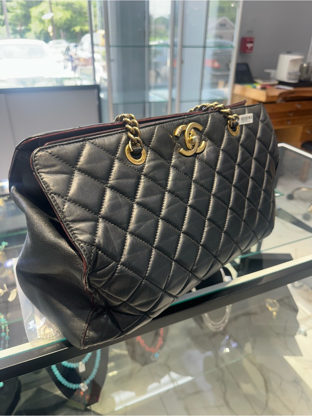 CHANEL Black Quilted Leather Shoulder Bag with Gold CC Hardware